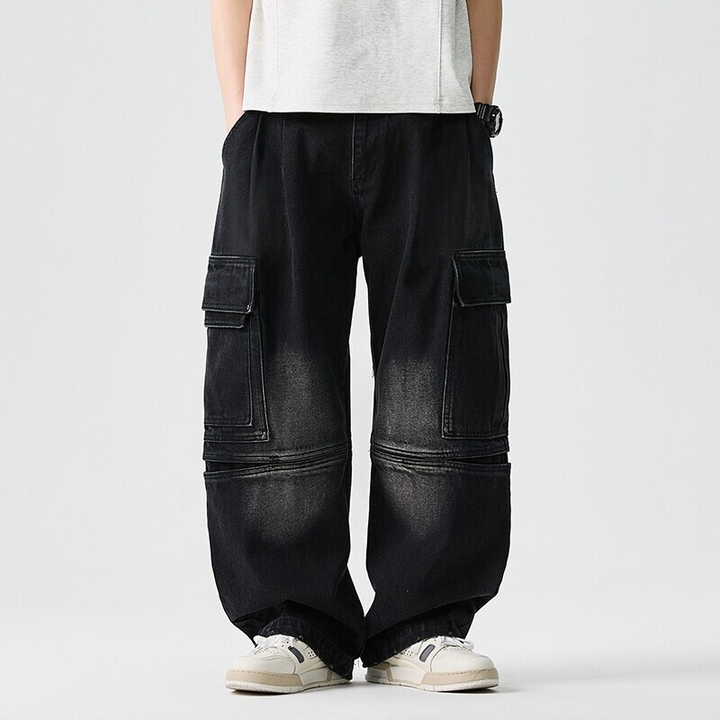 Close-up of comfortable unisex wide-leg denim pants showing utility pockets and durable denim fabric.