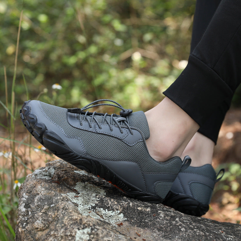 Athletic comfort unisex hiking shoes with wide toe box, promoting natural fit & foot health on trails.