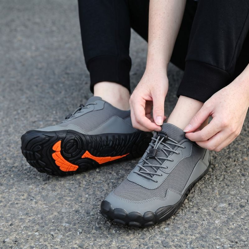 Durable unisex hiking shoes, wide toe box, orthopedic support, ideal for natural trail movement.