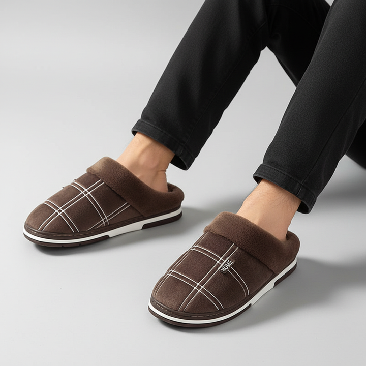 Padded unisex house slippers with a vibrant pattern, perfect for keeping feet warm and cozy during winter