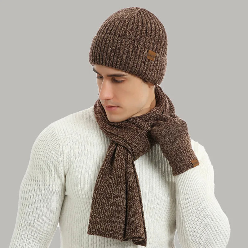 Complete winter outfit accessory set with a knitted hat, a warm scarf, and durable gloves.