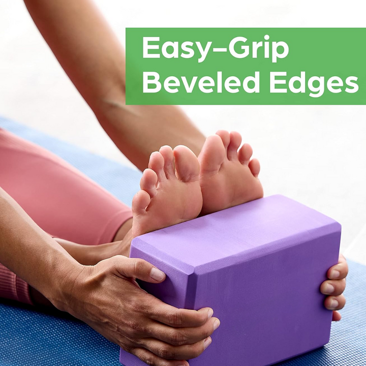 Person meditating with a lightweight EVA foam yoga block providing comfortable hip support for posture enhancement.