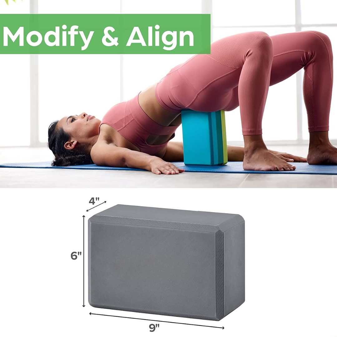 Hand gripping a lightweight, firm non-slip EVA foam yoga block, highlighting its portability and sturdy design.