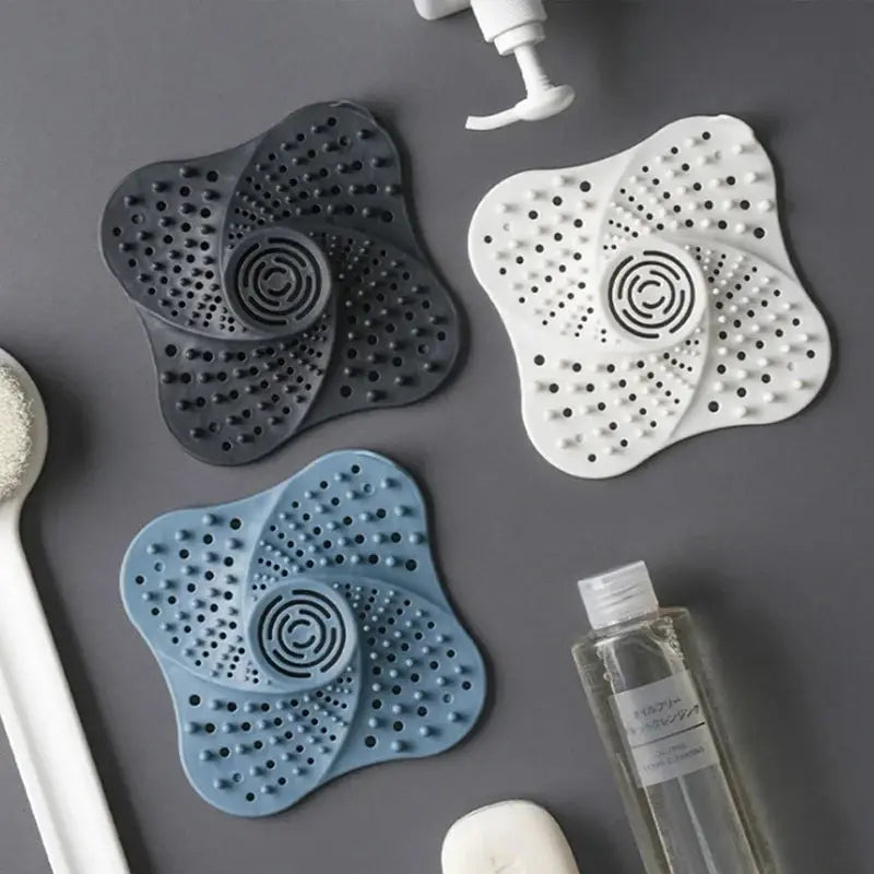 Universal anti-clog spiral drain hair catcher for shower and sink. Keeps plumbing clear in bathroom & kitchen.