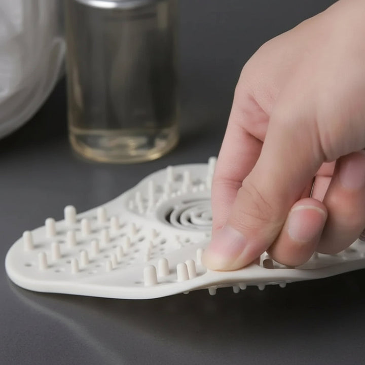 Stop shower & sink clogs with this spiral drain hair catcher. Effective bathroom & kitchen plumbing protector.