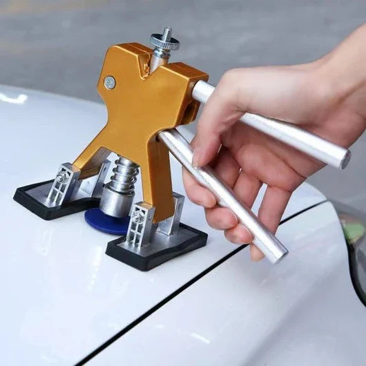 Universal car dent repair kit for paintless auto body removal. DIY tool for hail and door ding repair.