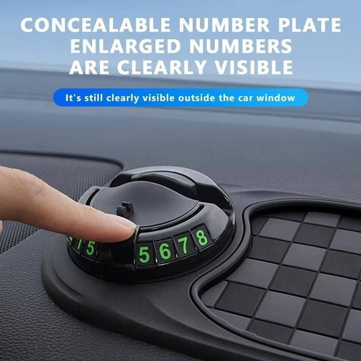 Anti-slip universal dashboard car phone mount with integrated storage tray and parking display.