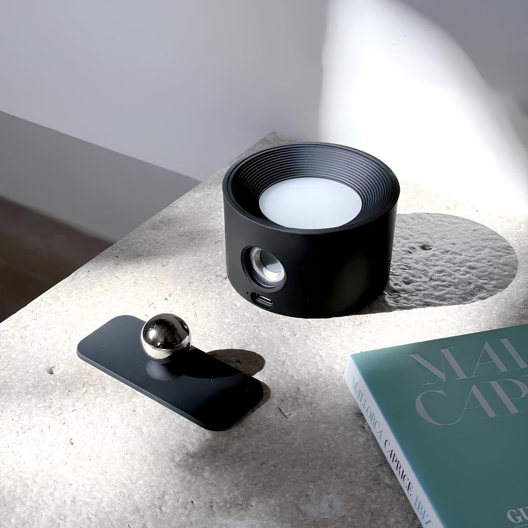 Sleek, modern wireless LED wall lamp, dimmable & rechargeable for stylish home decor.