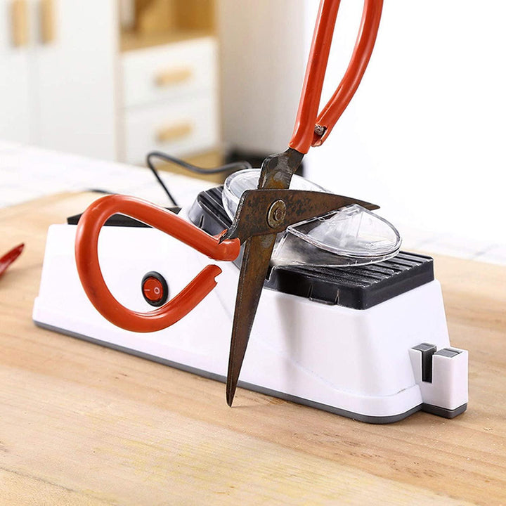 Rechargeable electric knife sharpener, ideal for all kitchen knives and scissor blades.