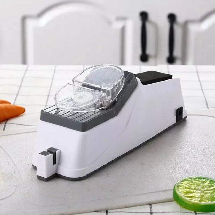 Electric blade sharpener for kitchen knives and scissors, ensures sharp, precise cuts.