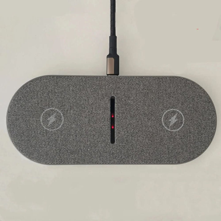 Convenient dual fast wireless charging station. Qi-compatible tech accessory for phones & earbuds, declutters desks.