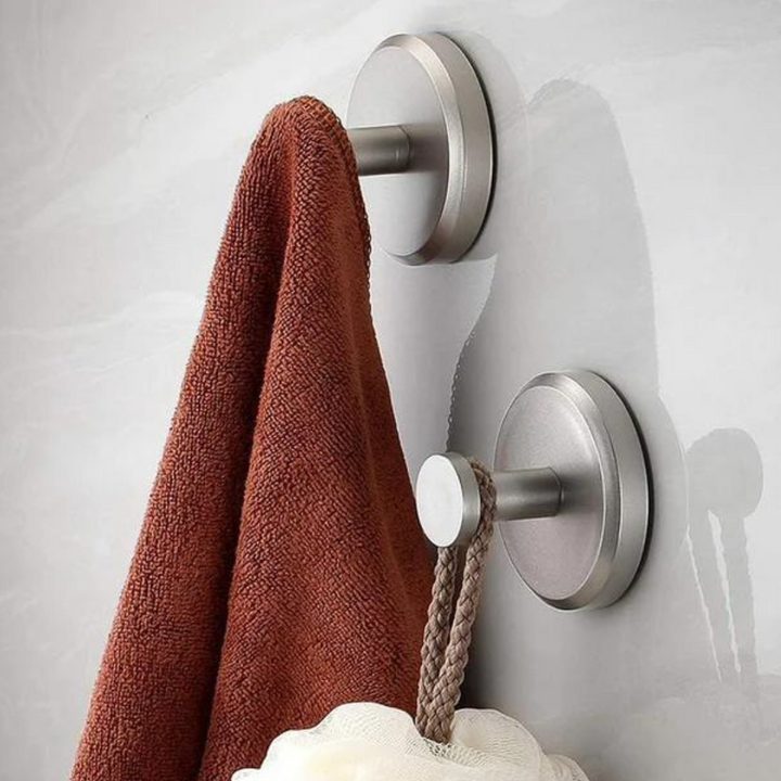 Achieve clutter-free spaces with versatile, heavy-duty instant grip suction hooks for home organization.