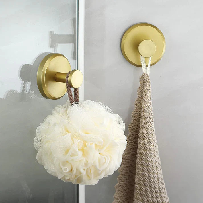 Heavy-duty instant grip suction hooks for kitchen storage. Organize utensils, towels without drilling.