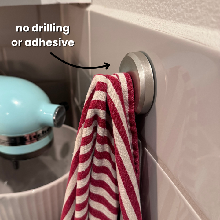 Universal instant grip suction hooks for hanging coats, bags, towels, or kitchen tools. No damage.