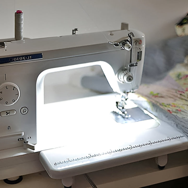 Universal LED light strip for sewing machines, enhancing precision & reducing eye strain. Ideal for quilting & crafting.