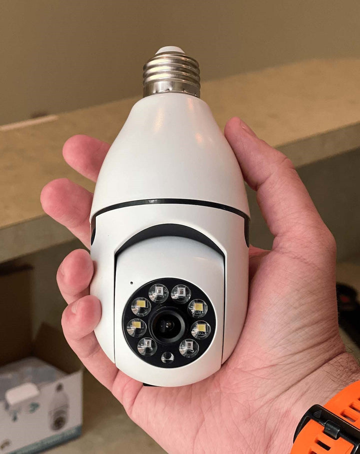 Universal light bulb security camera with 360° panoramic home view for wireless smart surveillance.