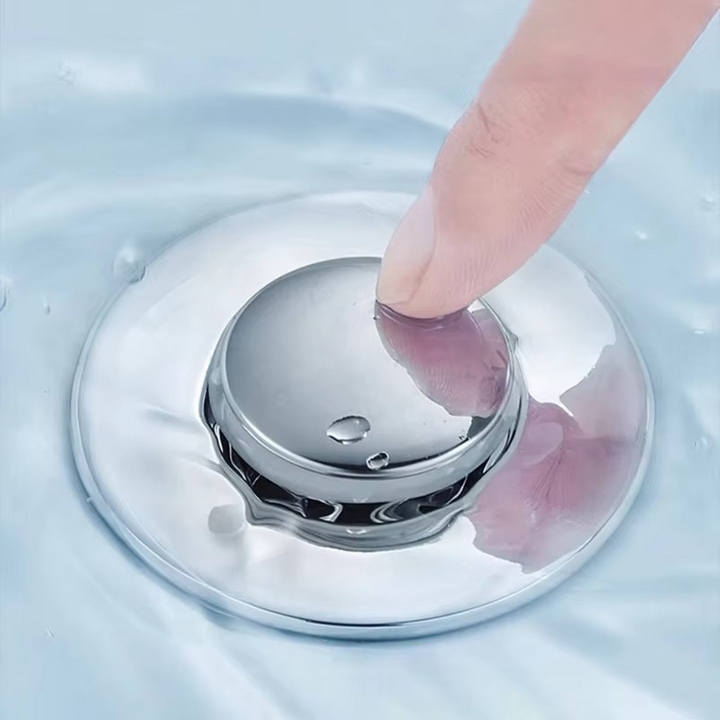 Prevent clogs with this universal pop-up sink drain stopper & hair catcher. Ideal for bathroom & kitchen sinks.
