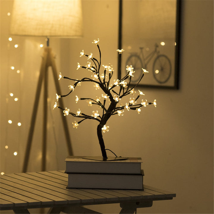 Close-up of a USB LED Cherry Blossom Table Tree Lamp, highlighting delicate blossoms and soft lighting.