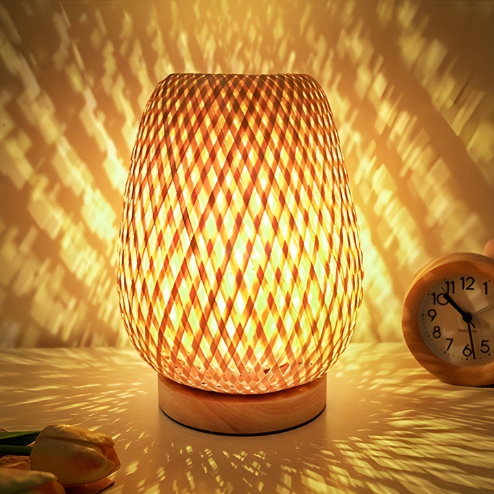 Decorative bamboo table lamp, USB powered for convenience, providing warm ambient lighting. Perfect for any room.