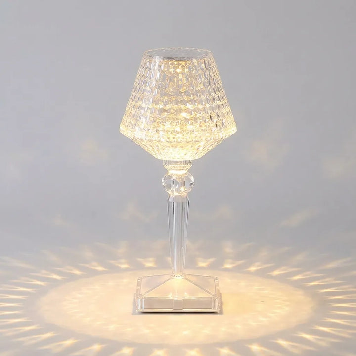 Cordless dimmable Crystalor lamp, emitting a warm glow, perfect for ambient lighting or as a night light.