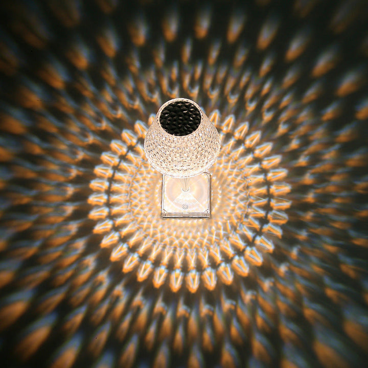 Close-up of a Crystalor table lamp, showcasing its intricate crystal-like design and soft, diffused light.