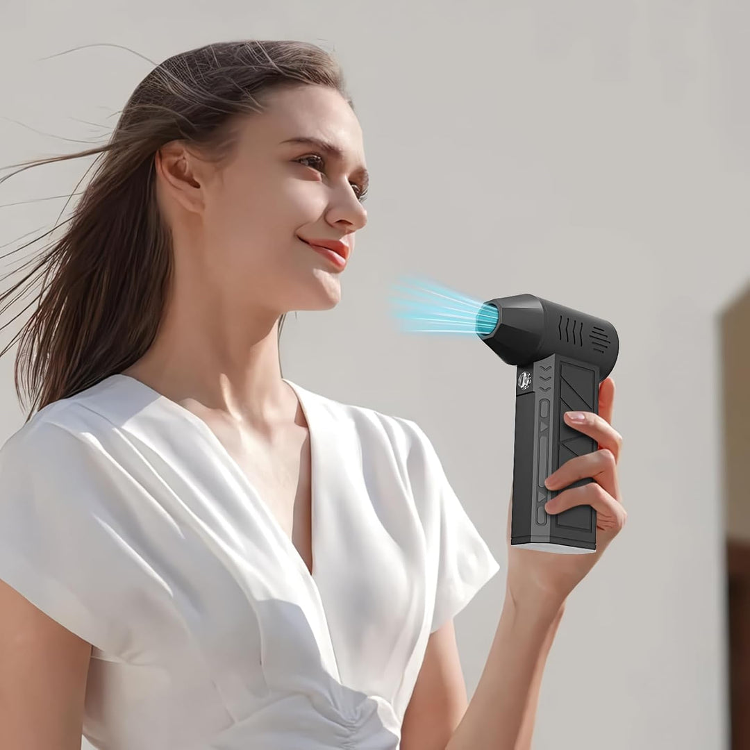 Portable electric duster with multiple nozzles, USB rechargeable for versatile cleaning.