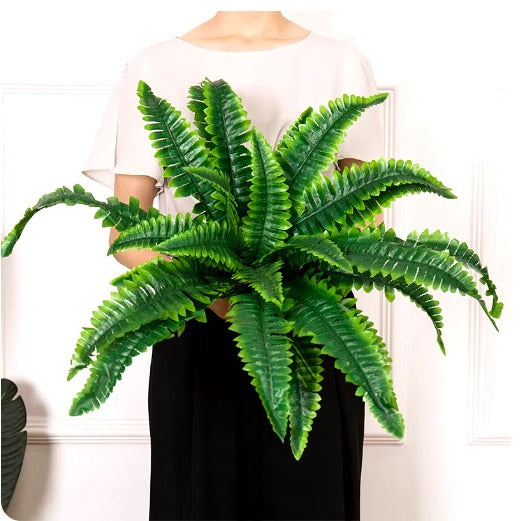Lifelike artificial Boston fern plant, no maintenance needed. Faux greenery for indoor or outdoor display.