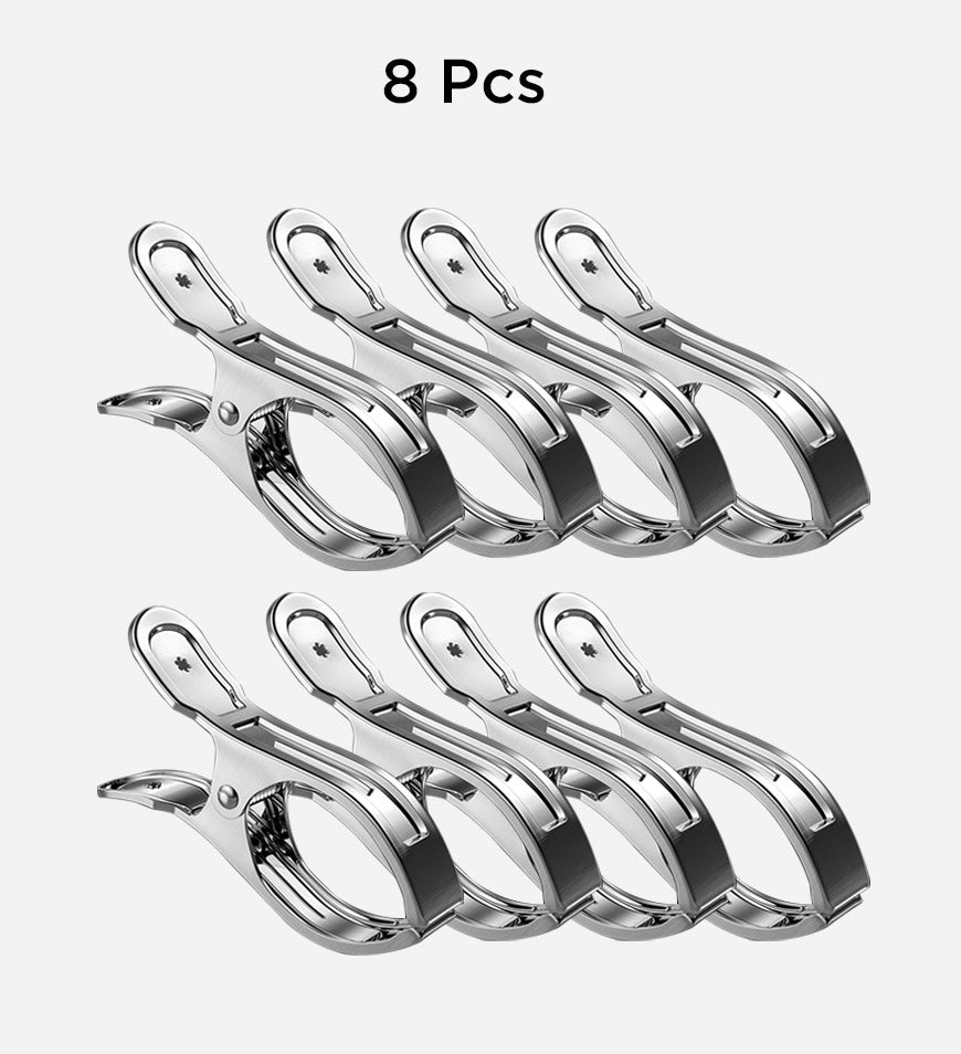 Heavy duty stainless steel towel clips by Veltrix, ideal for beach, pool, and home laundry