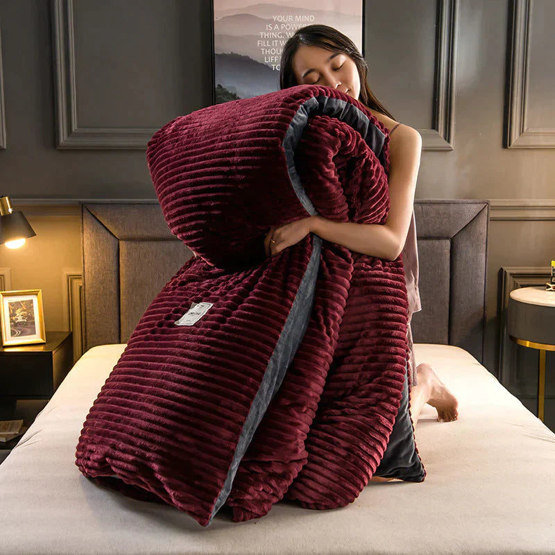 Complete velvety fleece bedding set, duvet cover and pillow shams, enhancing bedroom decor.