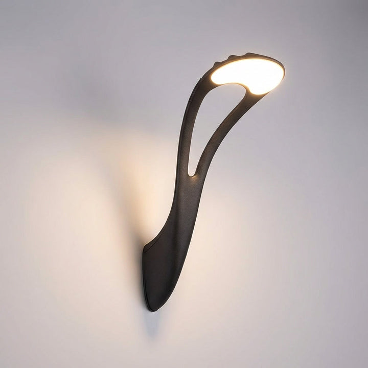 Weather-resistant VerdiGlow modern LED wall sconce, perfect for illuminating pathways and outdoor living spaces.
