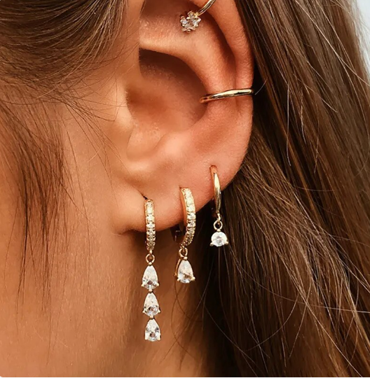 Aurora crystal dangle earrings set with linked chain, hypoallergenic women's accessory.