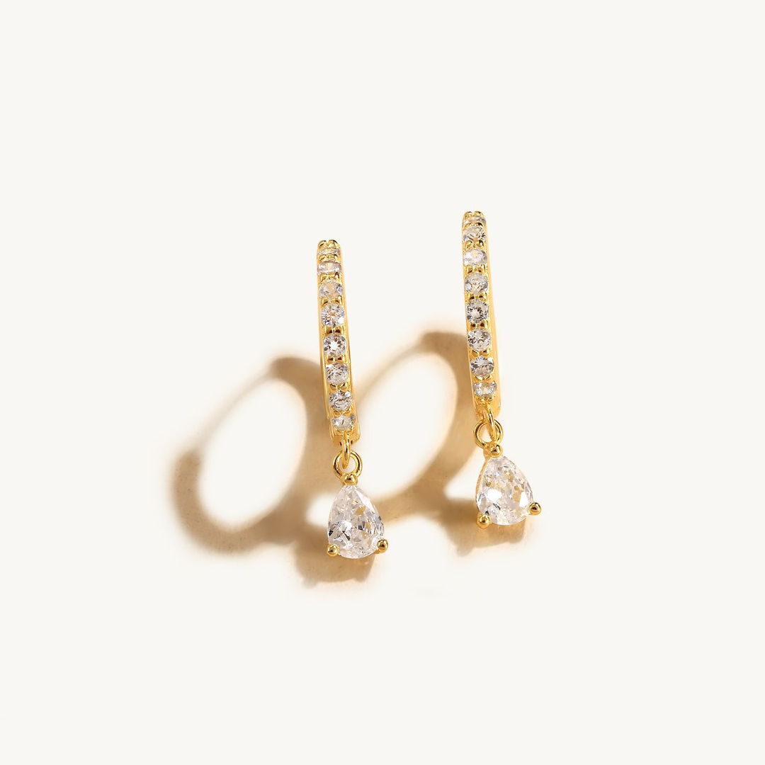 Silver Aurora crystal chain earrings for women, stylish and hypoallergenic accessory.