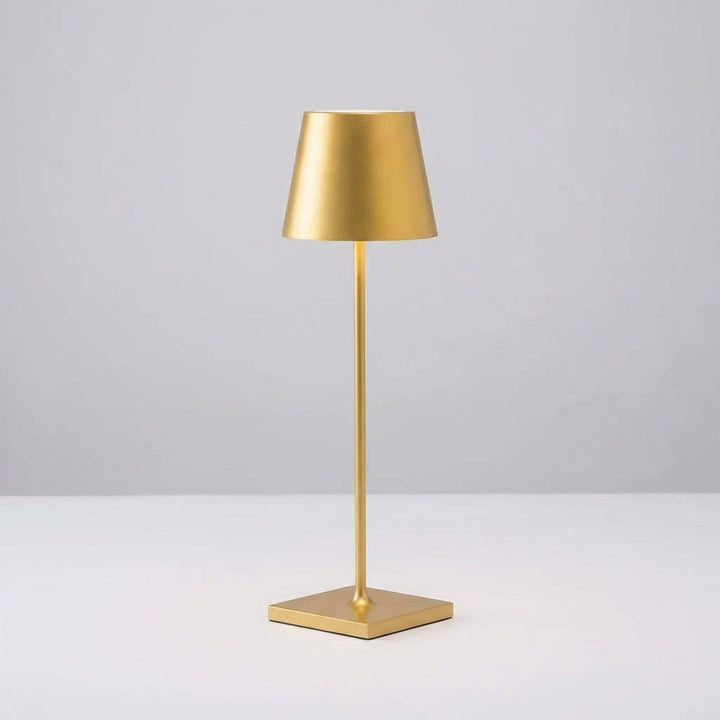 Sleek black wireless dimmable table lamp (Radiovo) illuminating a cozy reading nook, adding elegant home decor.
