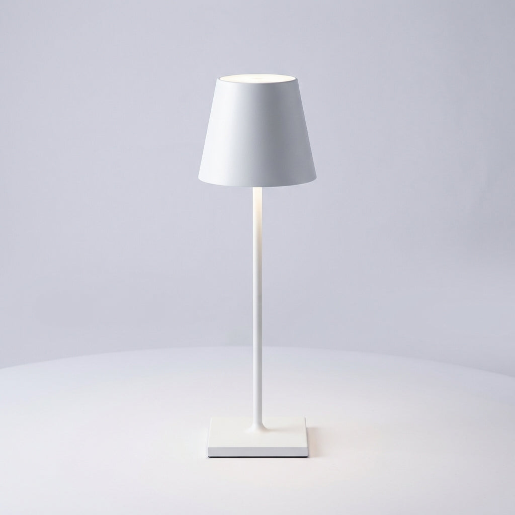 Radiovo portable dimmable lamp used as a stylish centerpiece on a dining table, offering soft, inviting light.