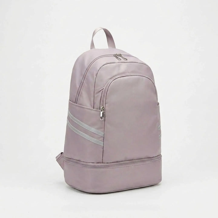 Interior view of multi-pocket sports backpack, showing laptop sleeve, organized compartments for gym & daily essentials.
