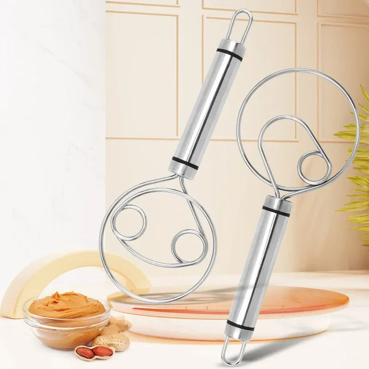 Versatile stainless steel whisk for effortless baking, mixing, and cooking. A durable kitchen tool.