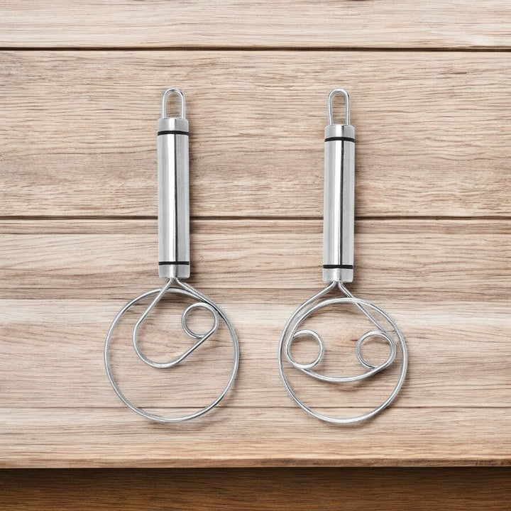 Ergonomic stainless steel whisk, perfect for culinary mixing tasks, baking, and cooking prep.