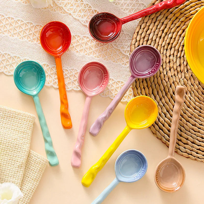 Vibrant 8-piece ceramic kitchen spoon set for cooking & serving. Durable, colorful wavy handles.