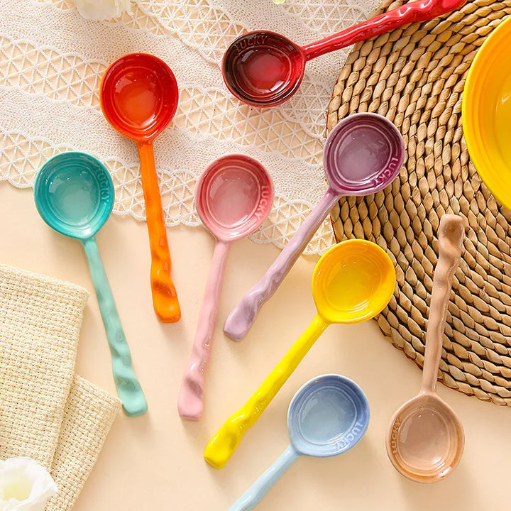 Vibrant 8-piece ceramic kitchen spoon set for cooking & serving. Durable, colorful wavy handles.