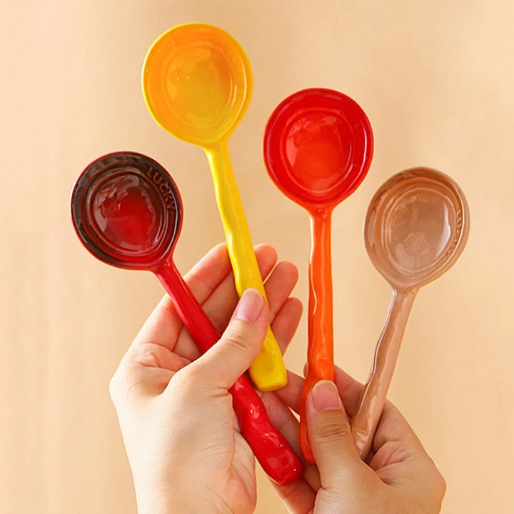 8-piece vibrant ceramic kitchen spoon set. Durable utensils for cooking, serving, home decor.