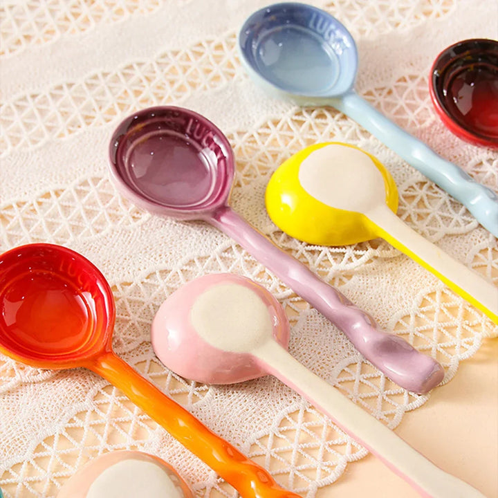 Colorful ceramic stirring spoons, 8-piece set, with unique wavy handles. Perfect kitchen utensils.