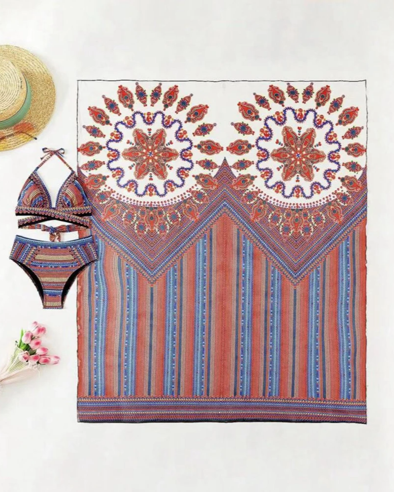 Woman elegantly walking in a vibrant boho 3-piece swim set, ethnic print high-waisted bikini & kimono.