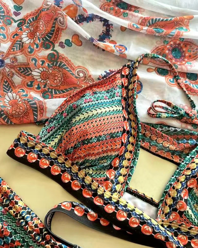 Stylish women's boho 3-piece swim set featuring ethnic print, high-waisted bikini, and a chic kimono.