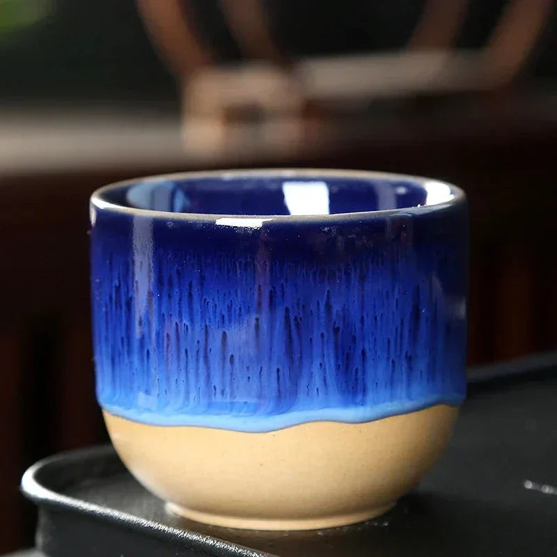 Artistic splatter design ceramic drinkware, a colorful addition to any kitchen.