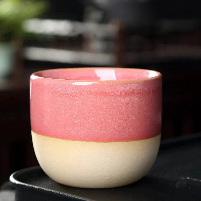 Ceramic coffee mug, vibrant and durable, with an eye-catching splatter design.