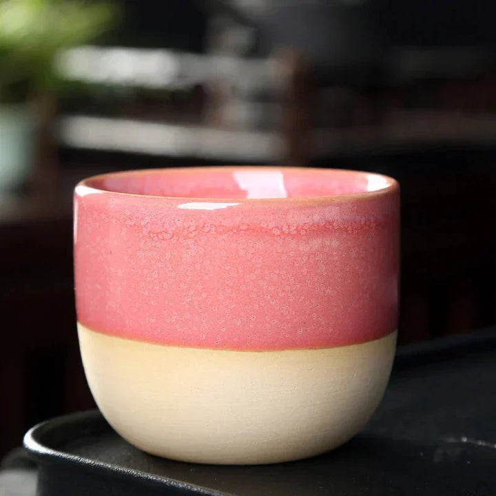 Ceramic coffee mug, vibrant and durable, with an eye-catching splatter design.