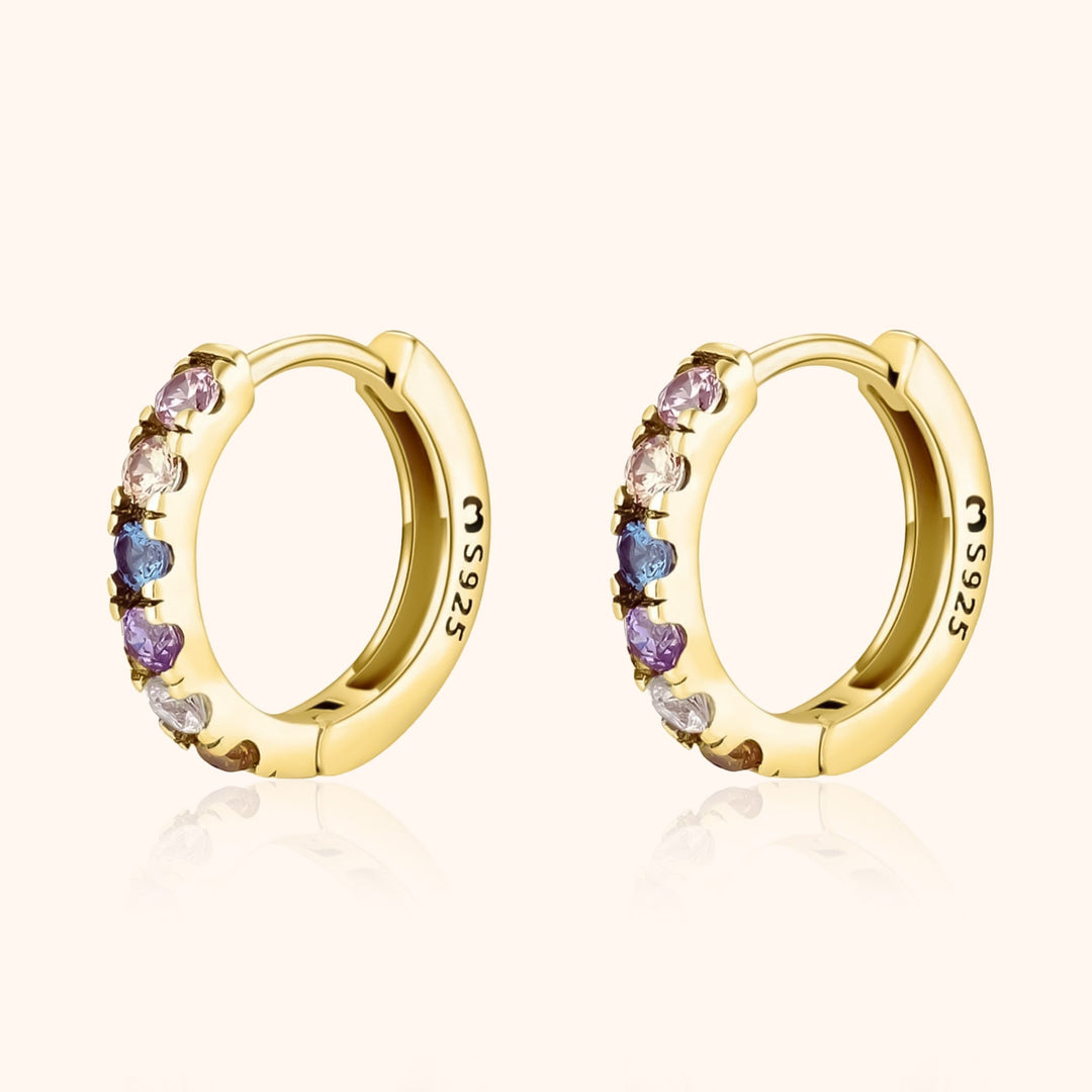 Vibrant colorful zirconia huggie earrings for women, perfect everyday sterling silver jewelry.