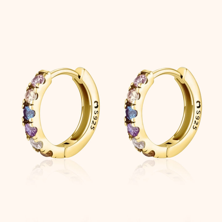 Vibrant colorful zirconia huggie earrings for women, perfect everyday sterling silver jewelry.