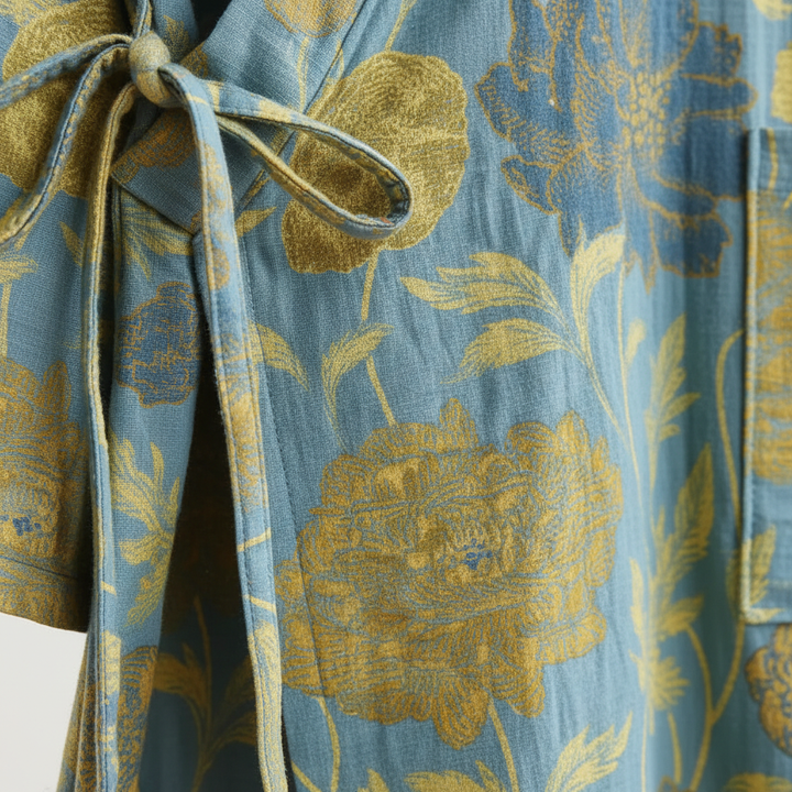 Stylish women's kimono robe with a vivid floral print made from soft cotton fabric