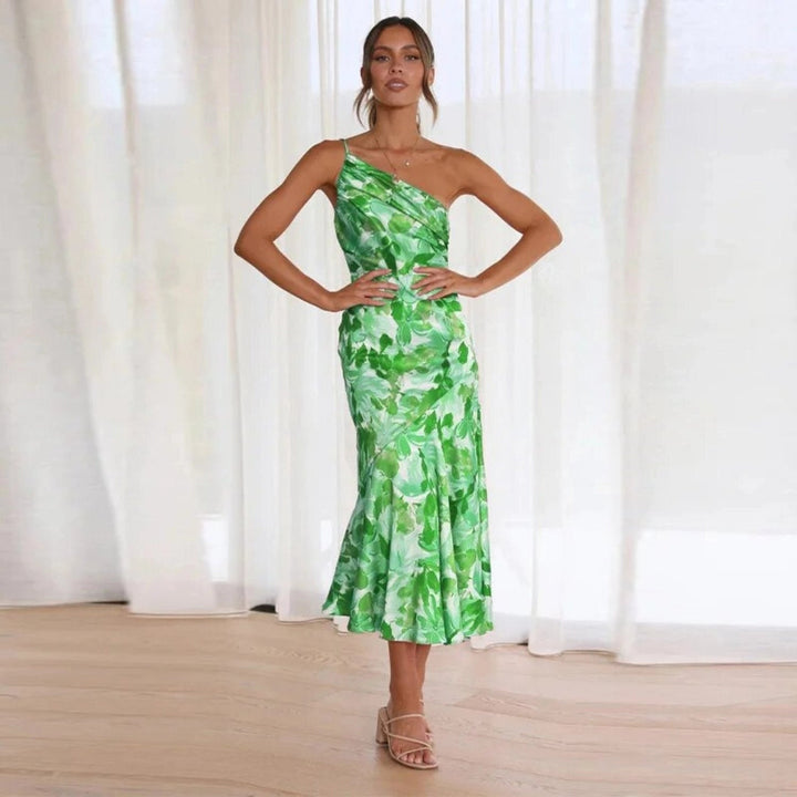 Beautiful women's floral asymmetric midi dress, vibrant print, flowing hem, perfect day-to-night summer style.